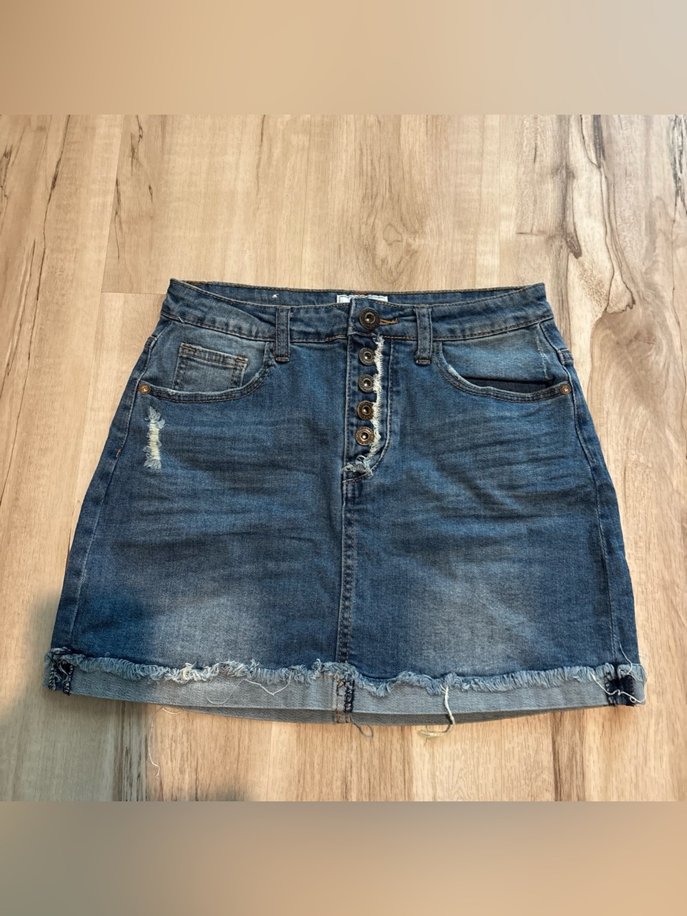 High-Rise Button-Front Denim Mini Skirt in Dark Blue
